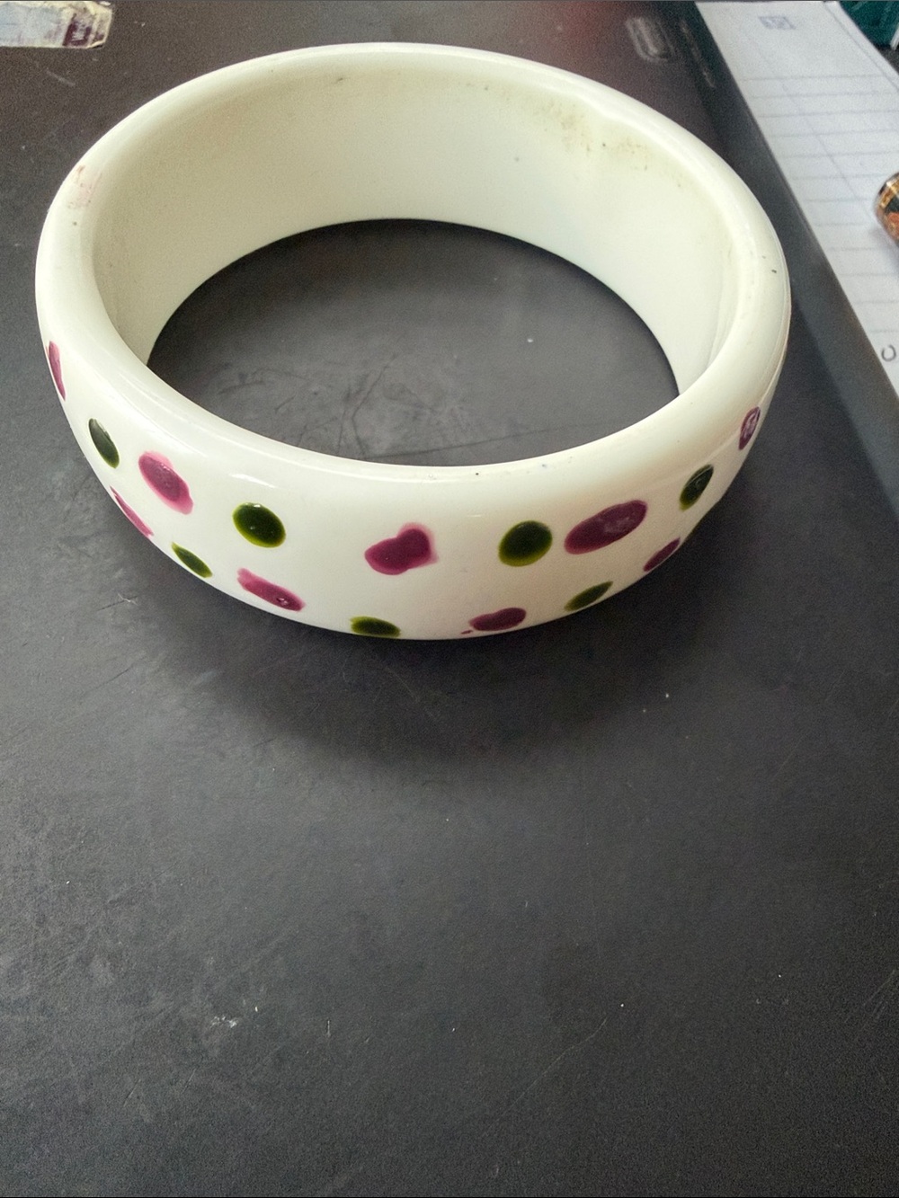 White Resin Bangle bracelet with dark green and dark Pink  polka Dots